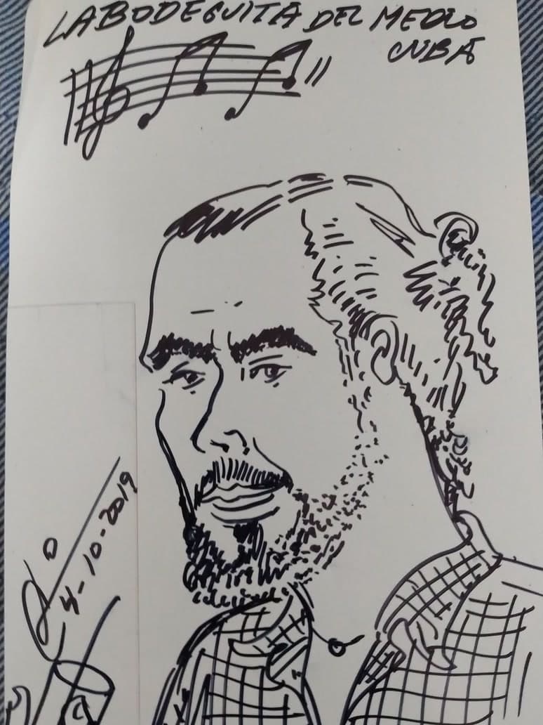 Pen-and-ink sketch caricature at La Bodeguita del Medio, Havana